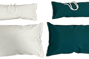 Picture showing two sets of Cobble Mountain Hammock Chair Pillows, one set is white the other is Green.