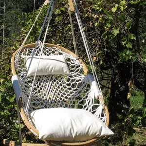 Cobble Mountain Original Hammock Chair Hanging outdoors with the optional Cobble Mountain foothold hanging below it.